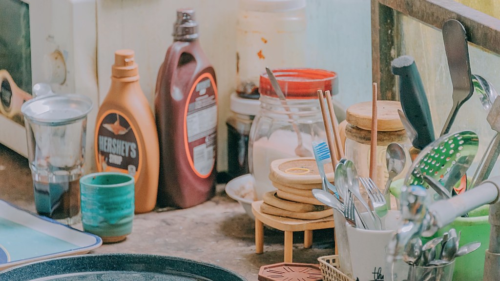 messy kitchen counter filled with items