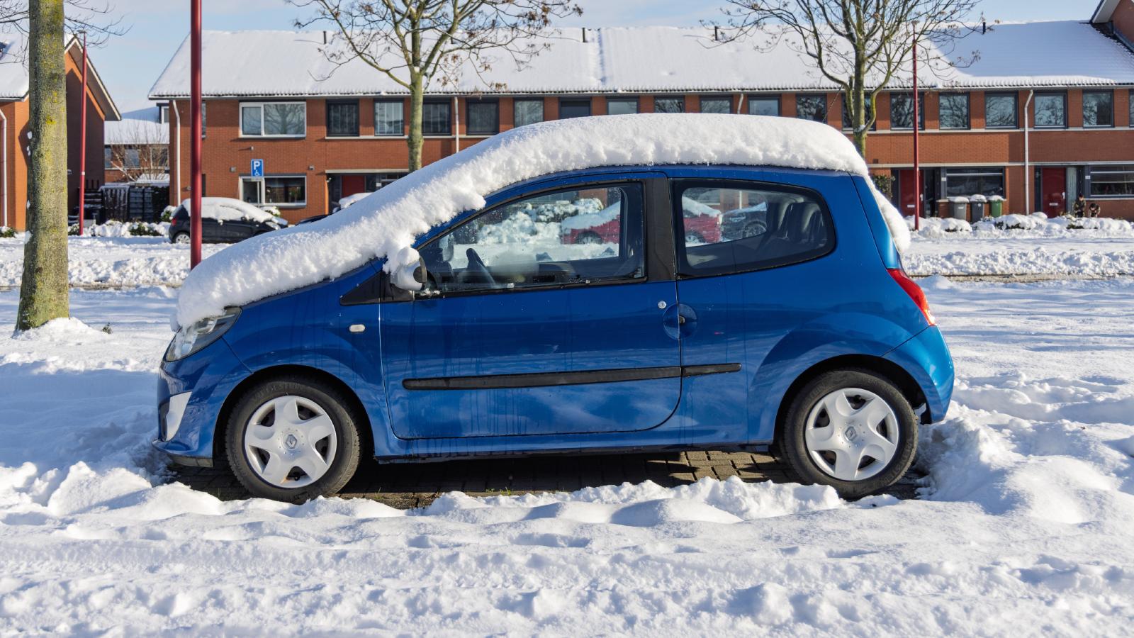 Her Neighbor Shoveled Out a Street Parking Spot—Then She Parked There After His Car Was Gone for Two Weeks car parked on a snowy street