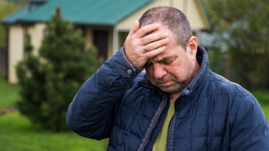 man in his front yard