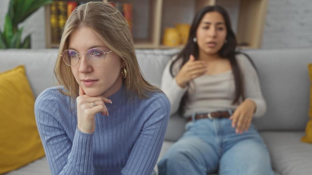 two women on a couch