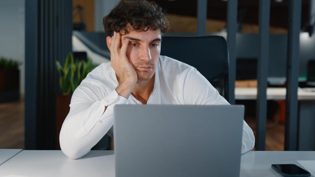 man at a work desk
