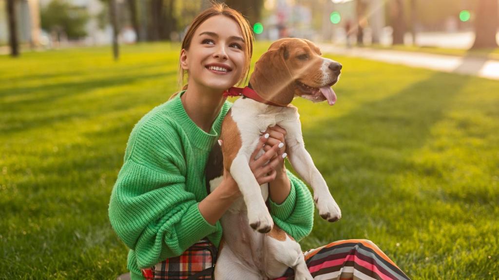 woman holding a dog