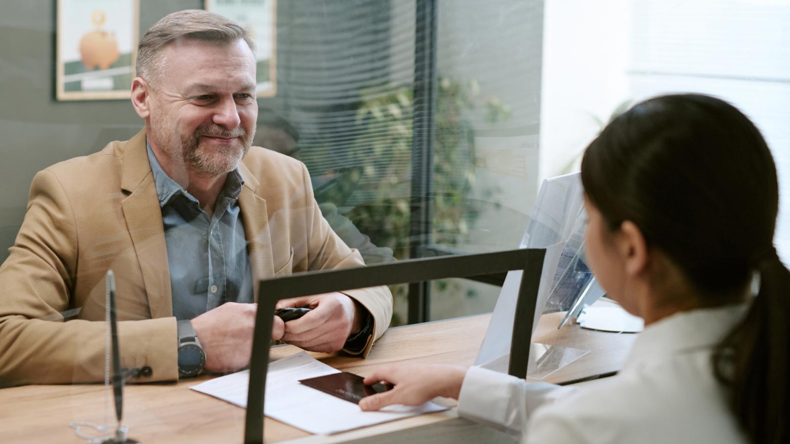 He Tried To Close His Bank Account—Then The Bank Made It Surprisingly Difficult man at a bank