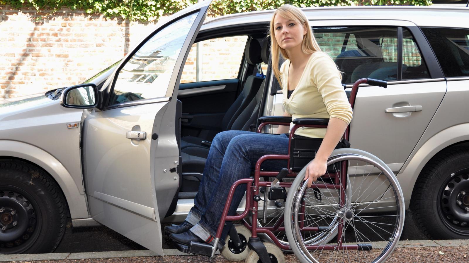 She Uses a Wheelchair to Pick Up Her Child—But Drivers Without Placards Keep Taking Her Parking Spot woman in a wheelchair