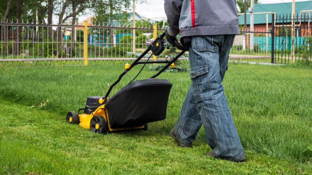 man mowing a lawn