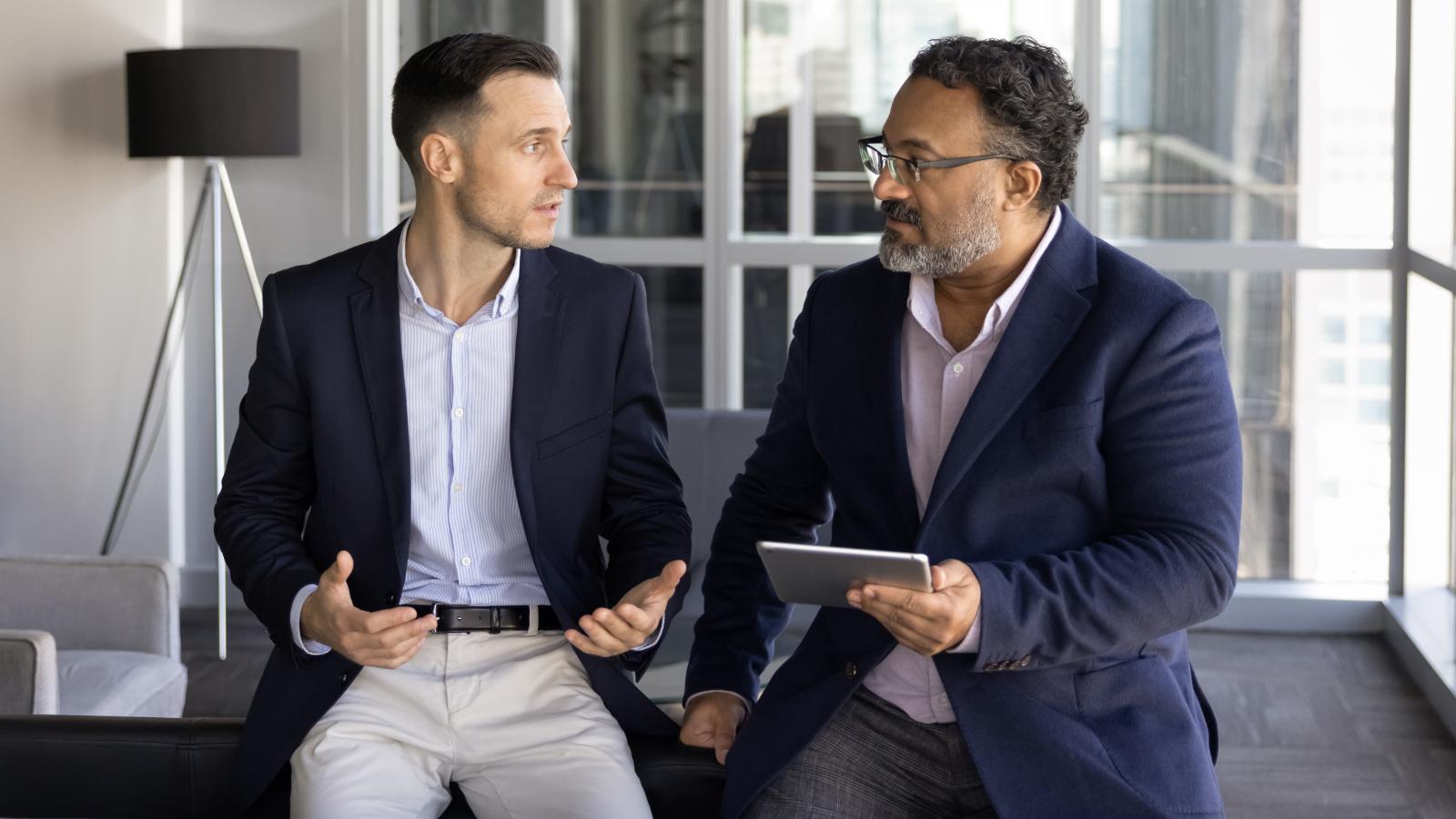 He Was Honest About the Problems at Work—But Doesn’t Think His Managers Will Change Anything two men in an office