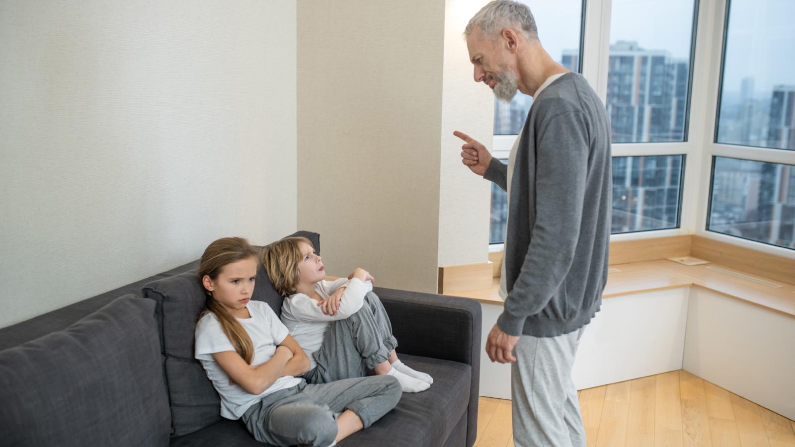 man talking to his kids