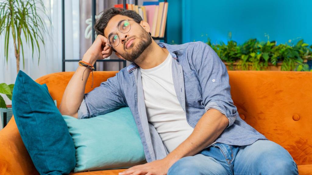 man sitting on a couch