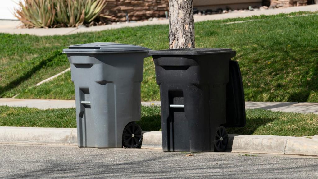 trash cans on a street