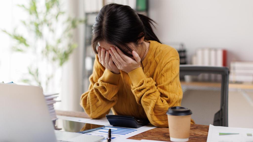 woman stressed out at her desk