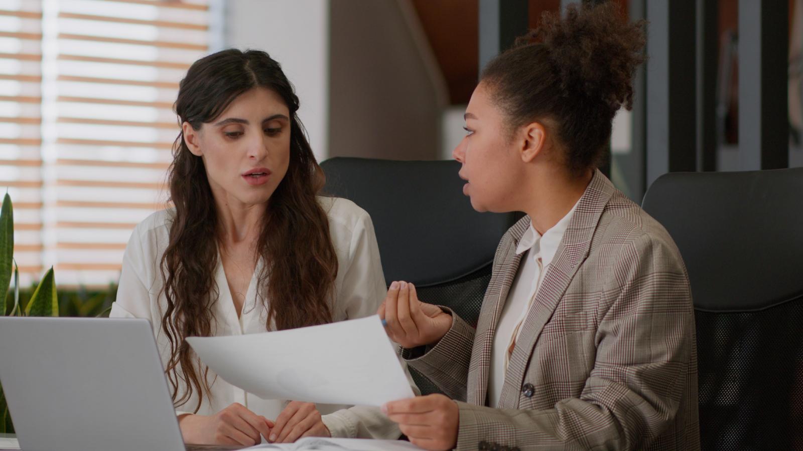 A Coworker Tried to Blame Her for an Event Disaster—So She Called Out the Lie in Front of Everyone two women in an office