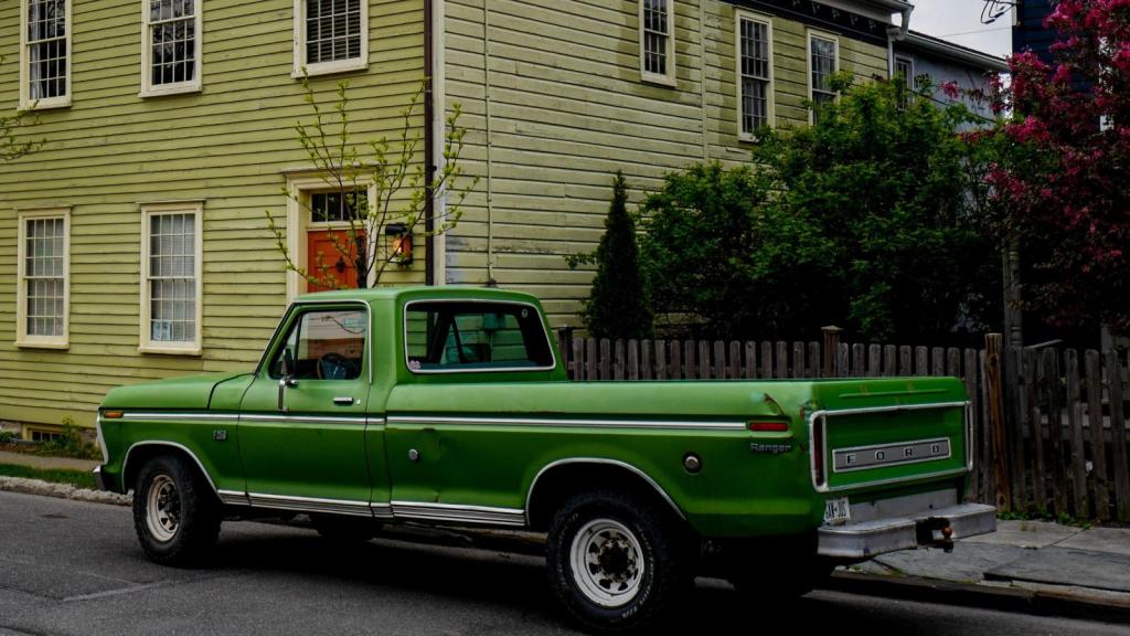 truck parked in front of a house
