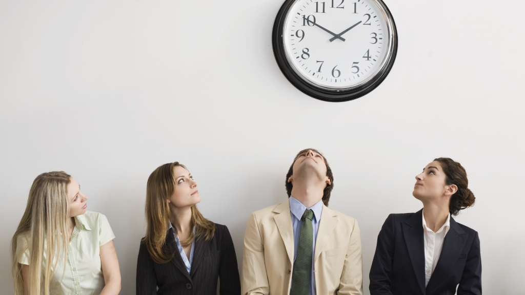 office workers waiting to clock out