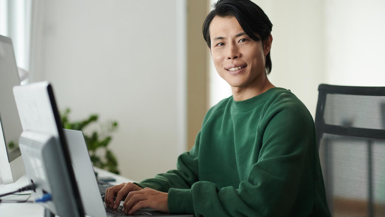 man working on a computer