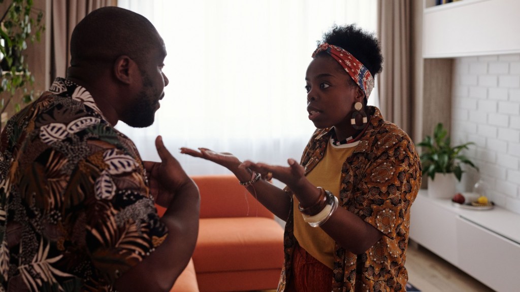 a woman and a man arguing