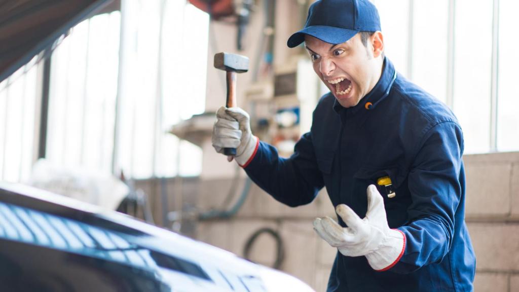 mechanic yelling in his shop