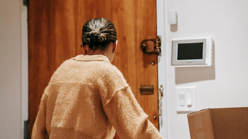 renter looking at front door