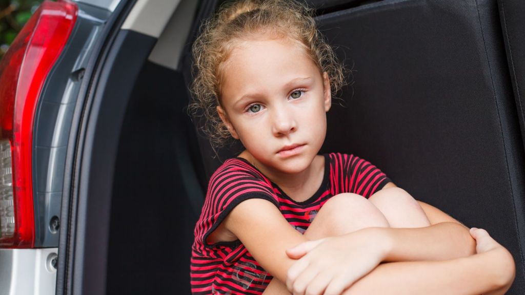 sad girl waiting in car