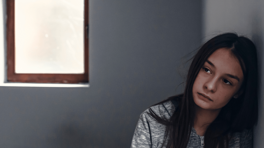 sad young girl thinking