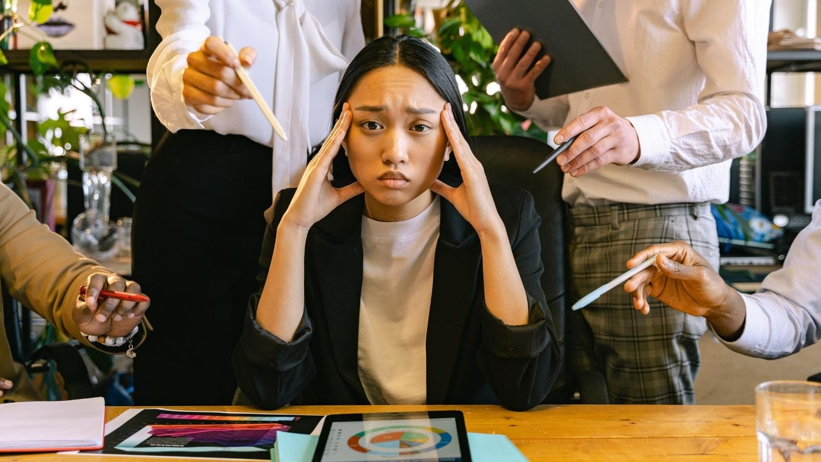 He Was Retraining After Two Brain Injuries—Then a Departing Toxic Boss Fired Him Out of Spite stressed employee at her job