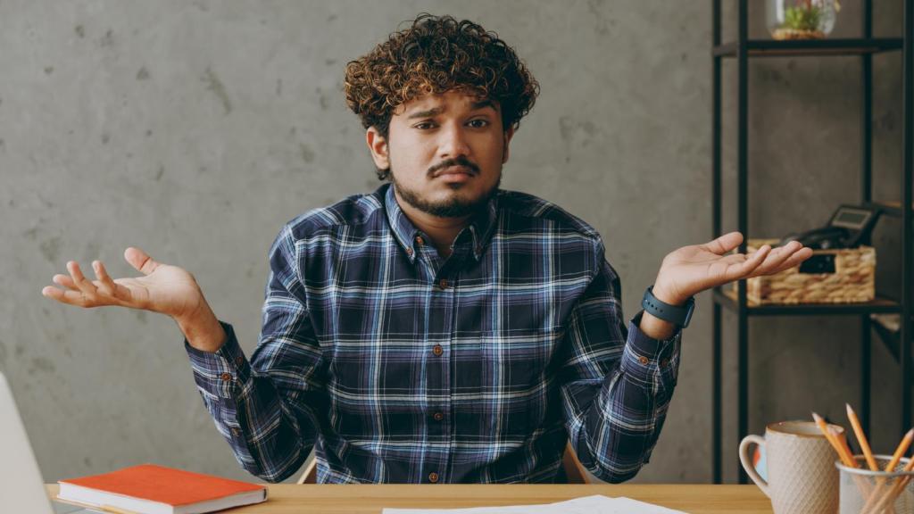 man shrugging his shoulders