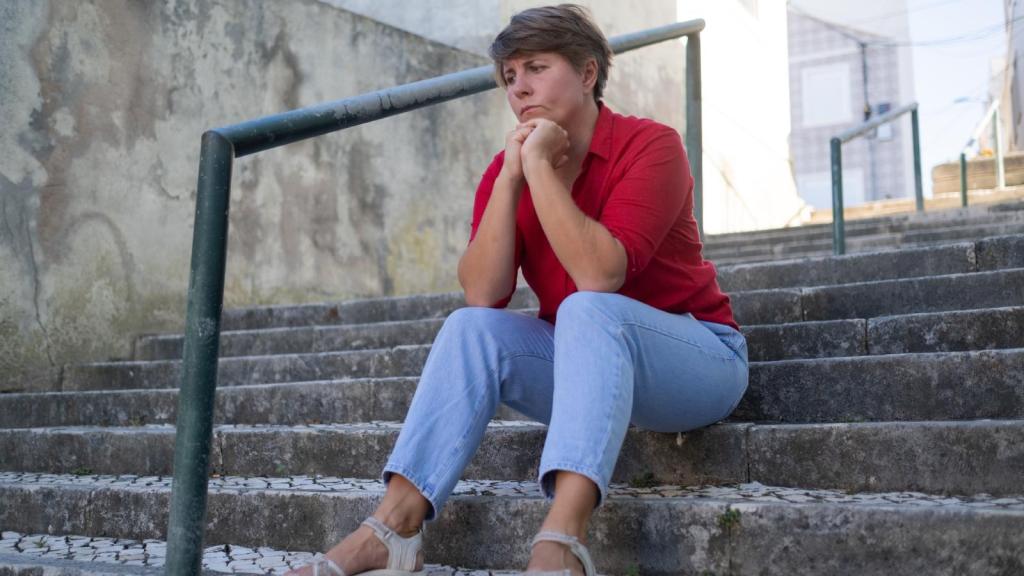 woman sitting on stairs