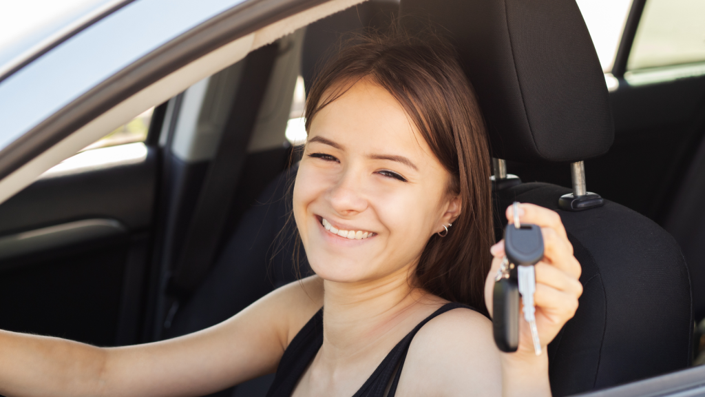 One Teen Thought Good Grades Would Earn Him A Car, But The Deal With His Uncle Eventually Unraveled And Created A Much Bigger Conflict teen girl with keys excited with new car
