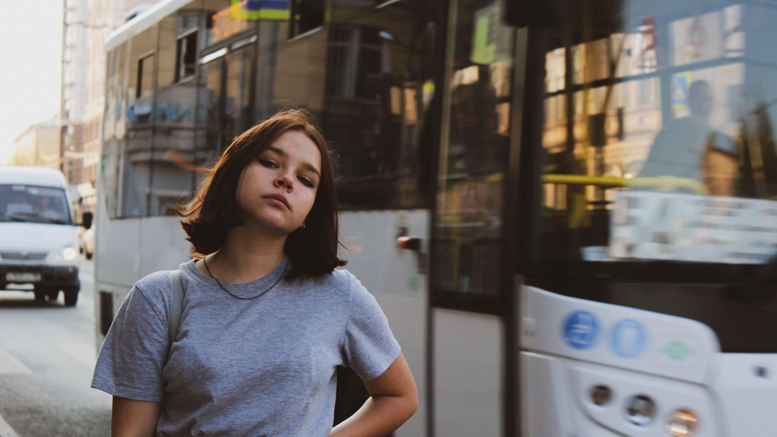 She Wouldnt Move Her Bike for His Fancy Racing Bike — So He Took Matters Into His Own Hands teen standing in front of a bus