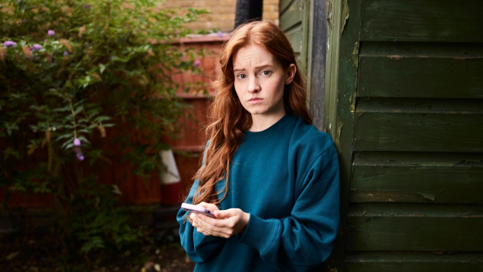 She Overheard Her Parents Talking About Having Another Child—Now She’s Afraid She’ll No Longer Matter teenage girl looking concerned