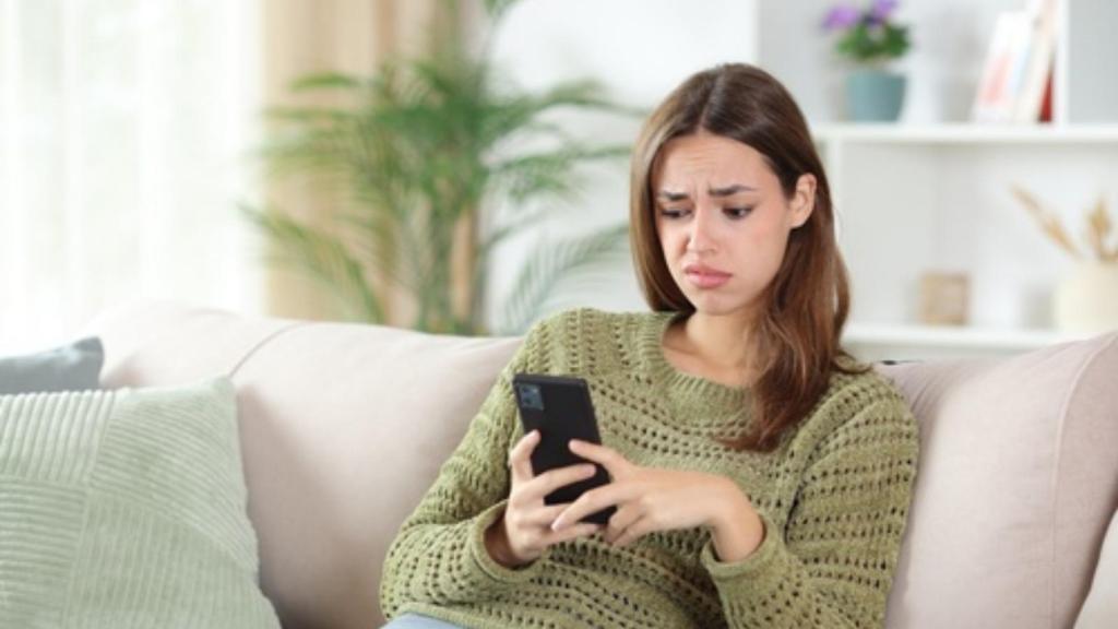 Woman annoyed with phone
