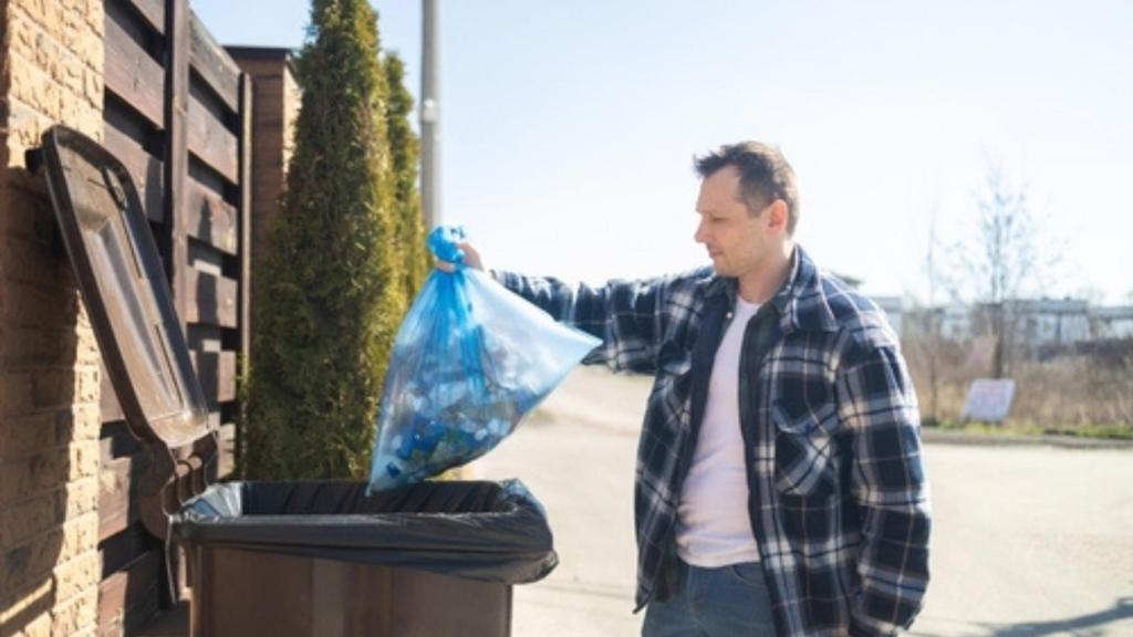 Man taking out trash