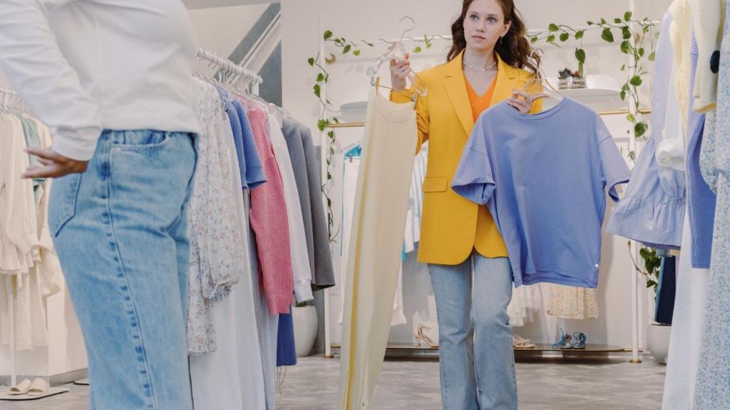two women in clothing store