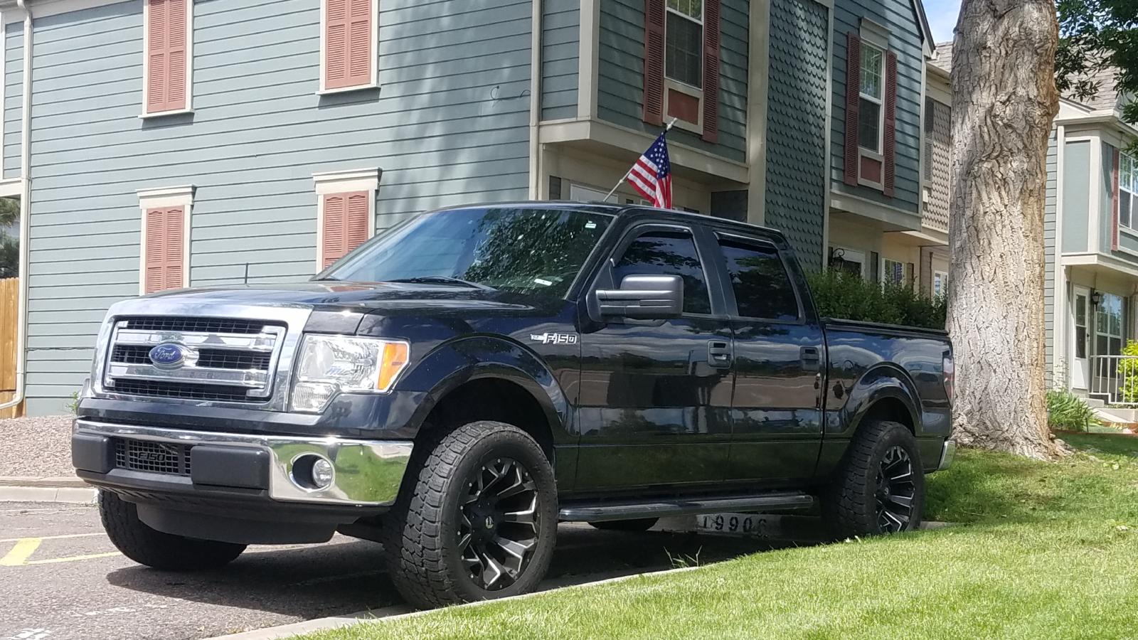 truck parked in front of a house