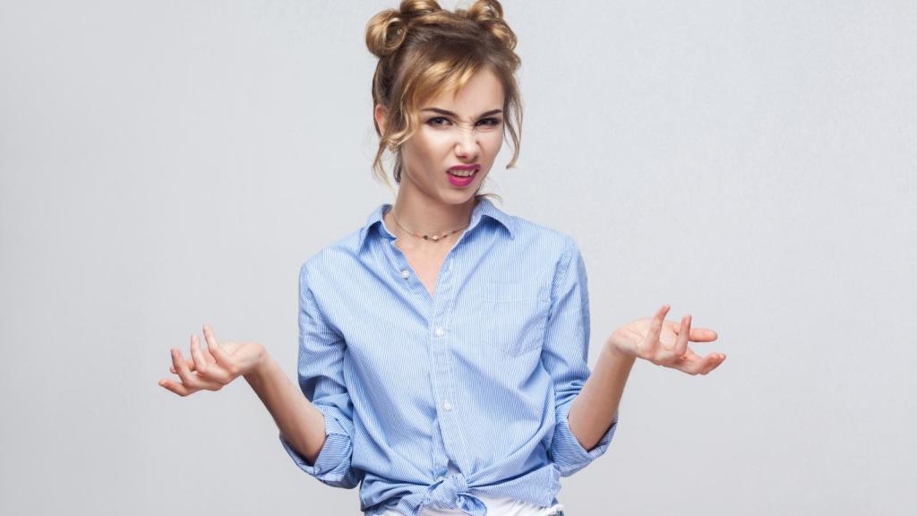woman shrugging her shoulders