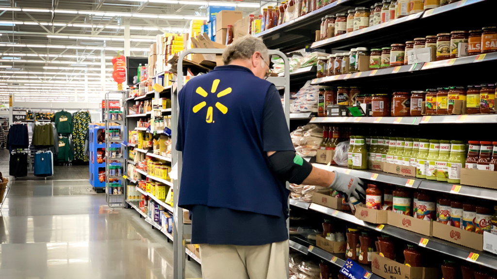 walmart employee stocking shelves