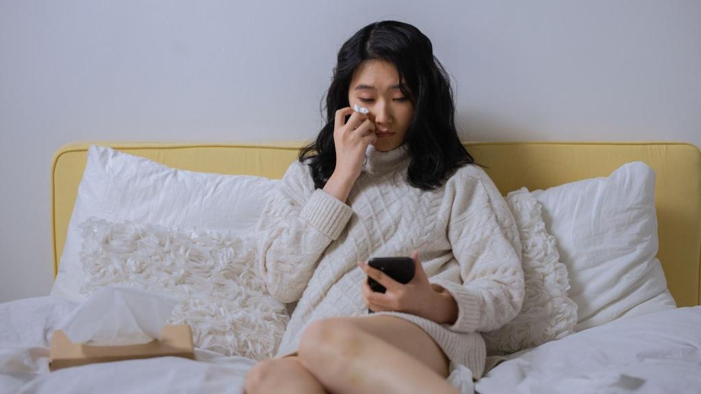 woman crying on the phone