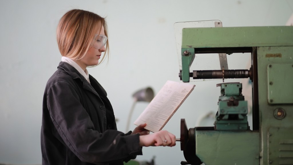 woman following manual at work