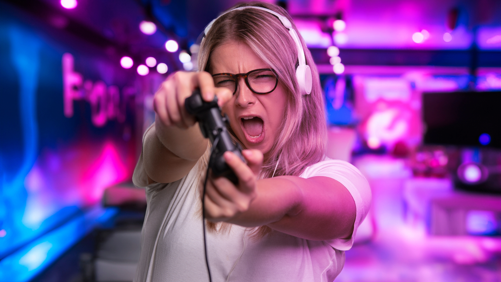 Her Younger Siblings Destroyed The Nintendo Switch She Bought With Her Own Money — So She Got A PS5 And Set A Firm New Rule woman having fun gaming with ps5