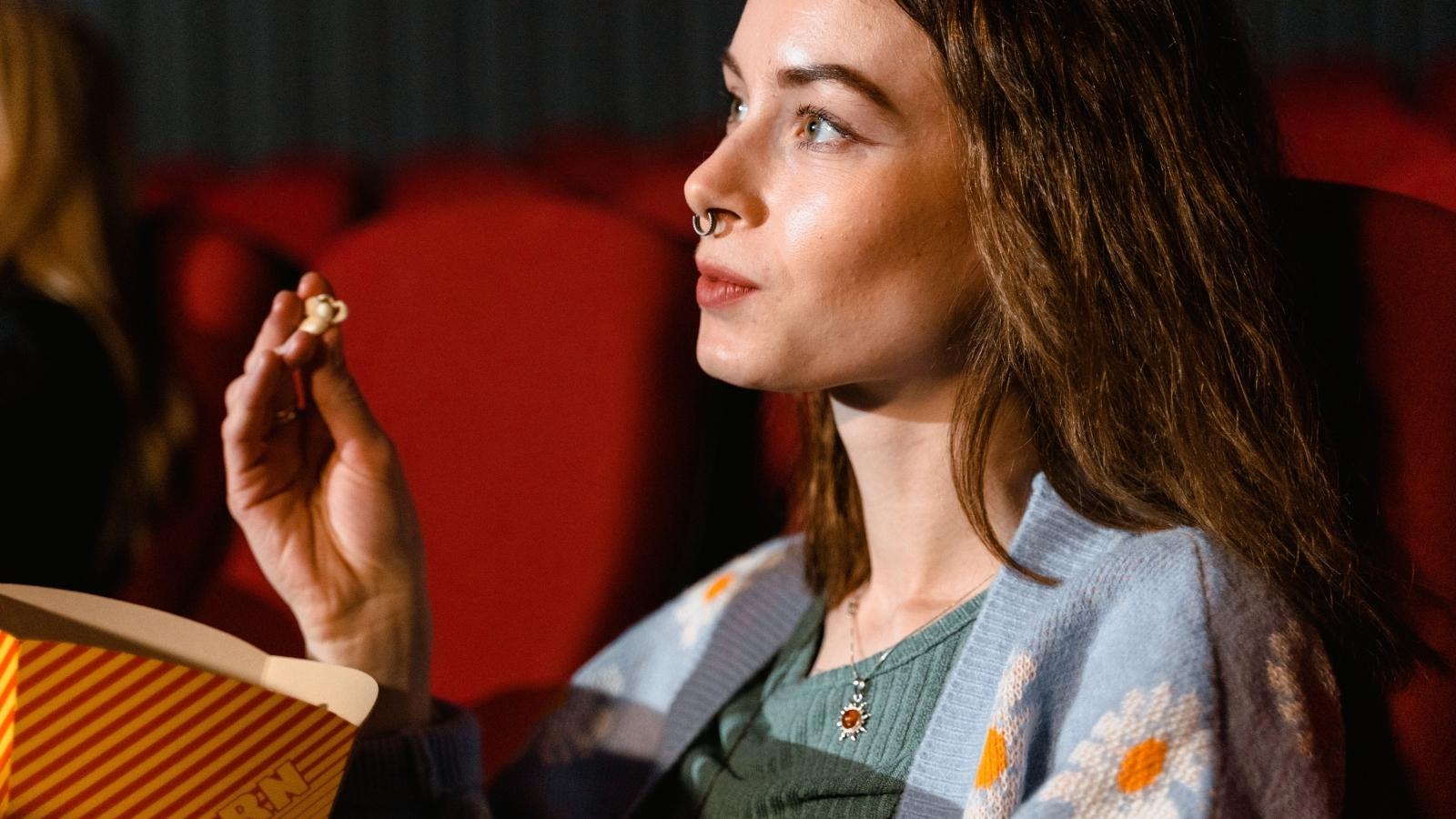 She Accidentally Gave a Stranger Wrong Directions at the Cinema—Sending Her on a Much Longer Walk woman in a movie theater