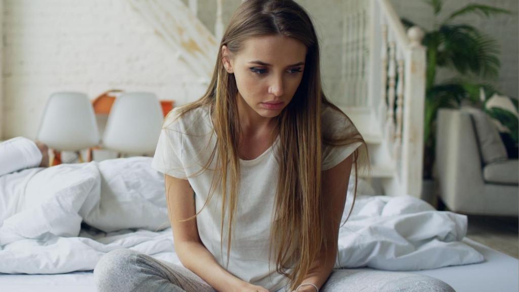 woman looking distressed