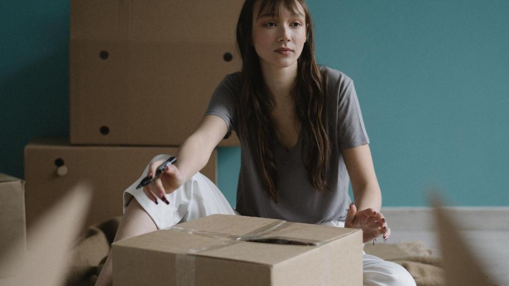 woman looking through a box
