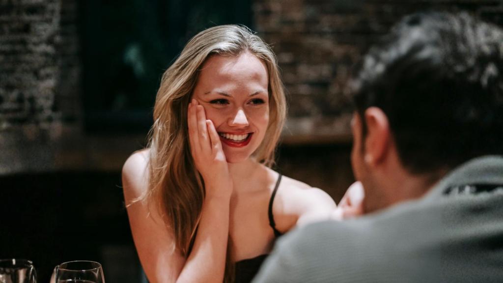 woman smiling at a man