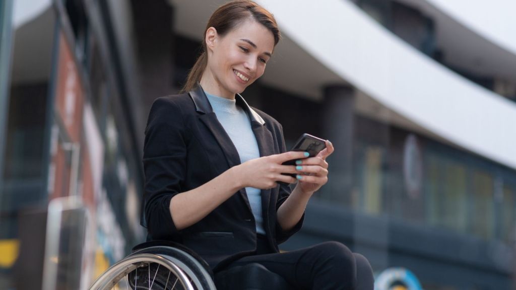 woman in a wheelchair on the phone