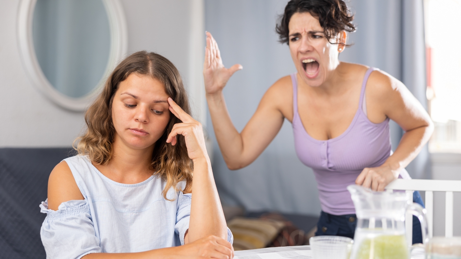 A Sister Asked To Stay With Family, But Her History Of Manipulation Left Her With A Hotel Instead woman very frustrated with her sister