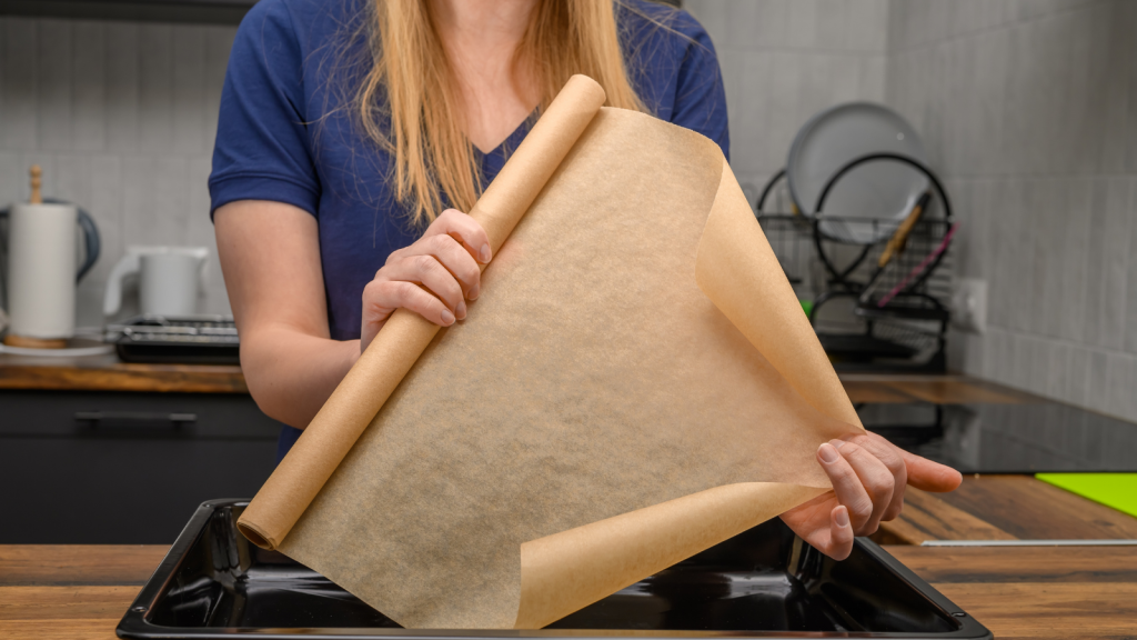 One Store Employee Let A Condescending Customer Keep Doubting Them, Then Returned With Three Rolls And Completely Flipped The Situation young woman holding out wax paper