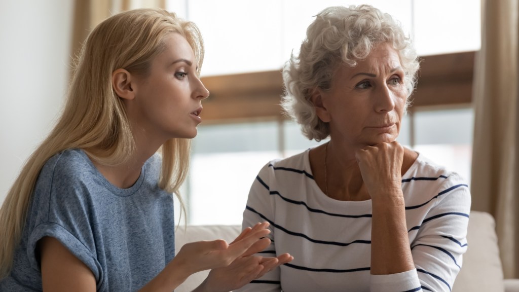 young woman pleads with grandmother