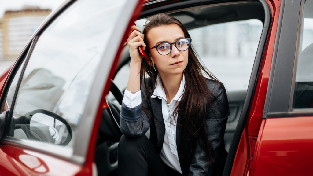Months Of Helping Her Pregnant Sister’s Household And Looking After Their Grandmother Didn’t Matter When She Finally Needed Support In Return young woman thinking with phone in hand in her car