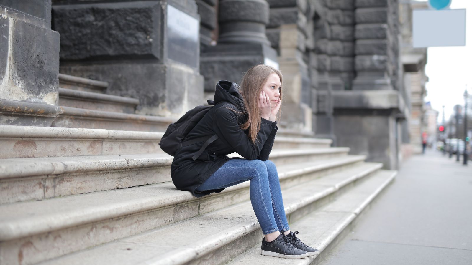 Woman sitting on stairs 