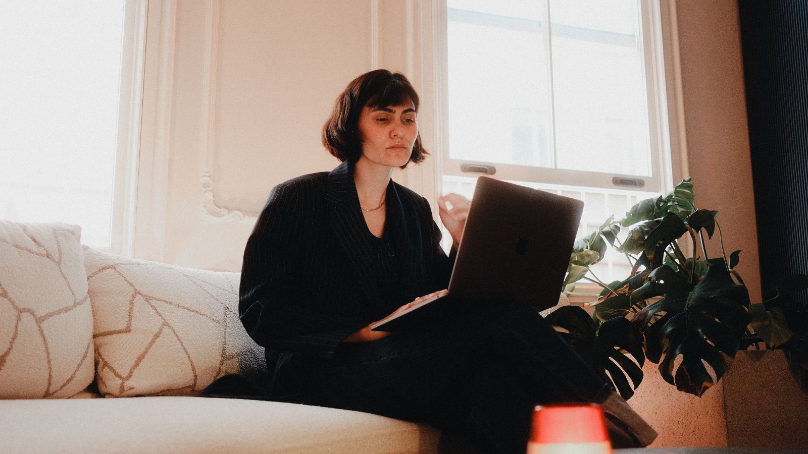 Woman in black outfit at work