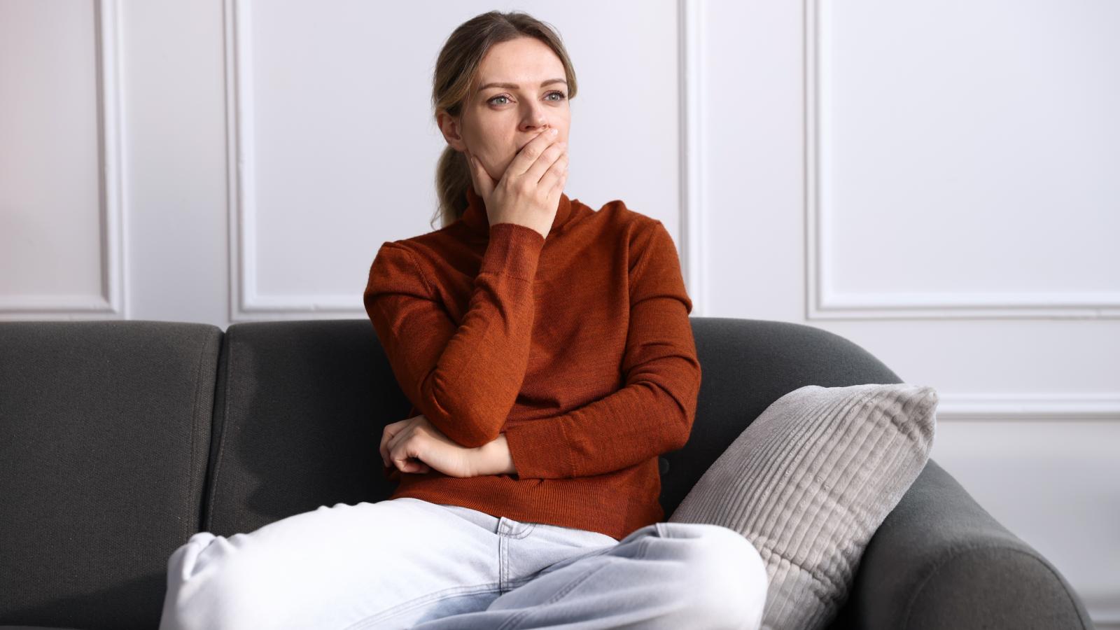 She Was Sued for Non Stop Stomping and Deliberate Midnight Noise—Then Dismantled Their Entire Case with Smart Home Audit Logs in Small Claims Court woman sitting on a couch
